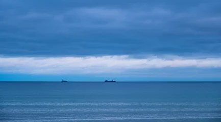 Photo sur Aluminium La Baltique, Sopot, Pologne Panoramic winter view of Baltic sea with gulls on water and ships over maritime horizon offshore Gdynia Orlowo district of Tricity in Pomerania region of Poland