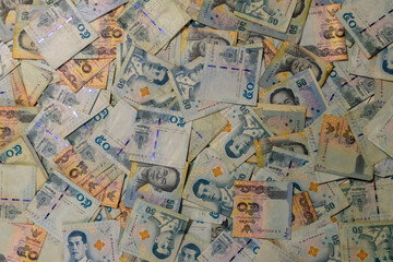 50 Thailand (THB) banknotes. The baht is the official currency of Thailand. 
