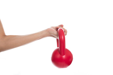 woman hand holding red kettlebell on white background, sport concept