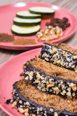 Pieces of zucchini dough with nuts and raisins. Delicious dessert