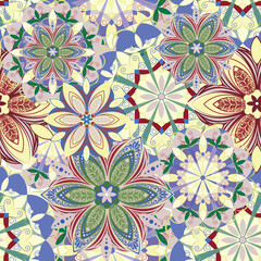 Mandala. Seamless pattern with stylized decorative flowers. Vector image. 