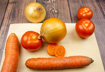 Ripe natural vegetables thumbs up. Super class on the background of vegetables. Healthy vegetarian vegetables.