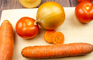 Ripe natural vegetables thumbs up. Super class on the background of vegetables. Healthy vegetarian vegetables.