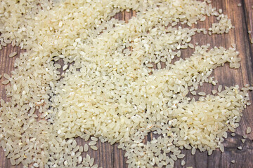 Rice close-up. natural rice. Rice groats. Rice and hands.