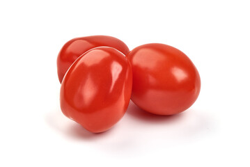 Cherry tomatoes, isolated on white background.
