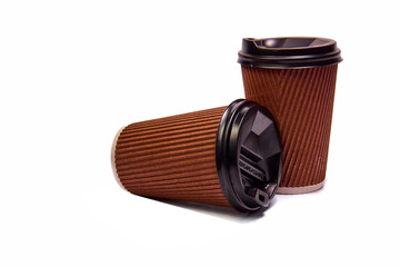 Two disposable paper cups with a lid for coffee or tea on a white background