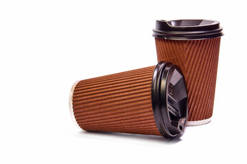 Two disposable paper cups with a lid for coffee or tea on a white background