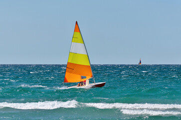 Colorful Sailboat Sailing on a Windy Sunny Summer Day on Georgian Bay 