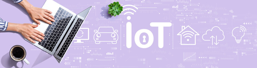 IoT theme with person using a laptop computer