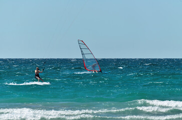 Kiteboard and Windsurf Action on a Windy Summer Day on Georgian Bay in Tiny Township