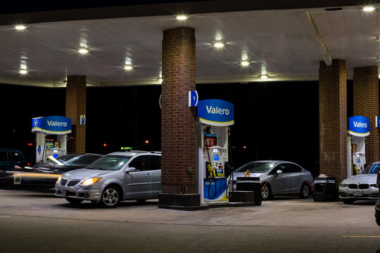 Busy Valero Gas station at night in Plano, Texas