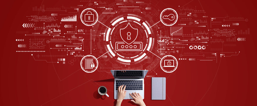 Cyber security theme with person working with a laptop