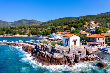 The little church of Panagia Gorgona situated on a rock in Skala Sykamias, a picturesque seaside...