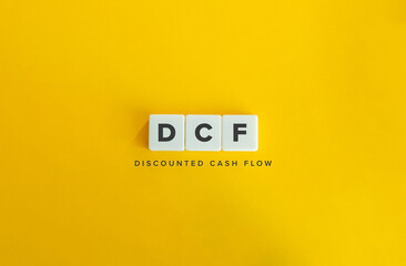 Discounted Cash Flow (DCF) Banner. Letter Tiles on Yellow Background. Minimal Aesthetics. - obrazy, fototapety, plakaty