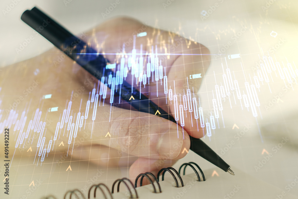 Poster multi exposure of abstract creative financial chart with world map and with man hand writing in note