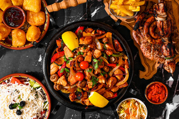 Grill Food Composition on Black Marble Table Rustic Kitchen Meals Colorful Ingredients Cast Iron Pan