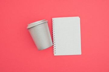  Office A6 notebook wire binding mock up blank template design idea. Gray coffee cup mockup against...