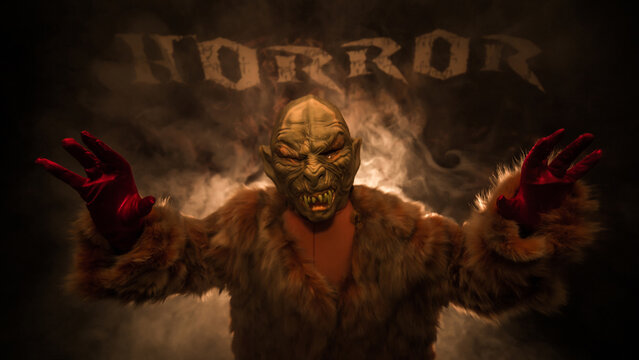 a vampire dressed in fur stands in the smoke and wants your blood