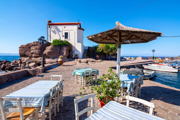 The little church of Panagia Gorgona situated on a rock in Skala Sykamias, a picturesque seaside...