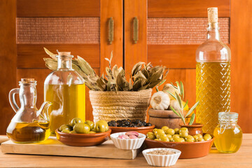 Obraz na płótnie Canvas Still life with olives and extra virgin olive oil.