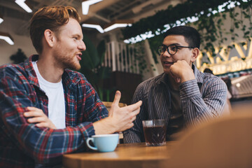 Multiracial business men working in office space