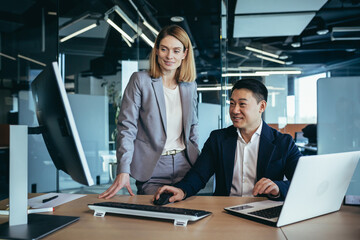 Sexual relationship and flirt at office. Young sensual Business lady seducing her busy male colleague. sexy secretary flirting with boss in the workplace. Business people Asian man and woman in work