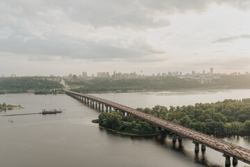 Aerial view of bridge across the Dnipro river in Kyiv, Ukraine.