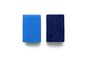 Two blue kitchen sponges with a soft and rough texture on a white background. Kitchen tool for washing dishes. The rough side of a kitchen sponge for removing burns and heavy soiling from dishes