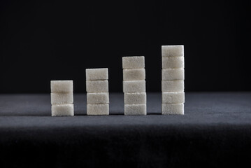 Growth chart made with sugar cubes. A concept for rising diabetic patients globally.