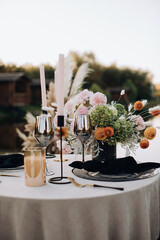 Organize a romantic dinner for two outside in the boho style