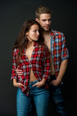 relationship of casual girl and guy on black background, love