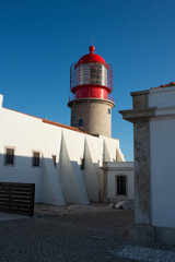 White building next to the Lighthouse at Cape st Vincent, Algarve, Portugal