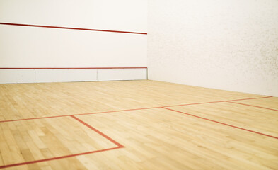Where are the players when we need them. Shot of an empty squash court.