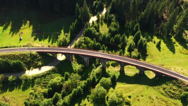 Drone flight over an ancient Austrian viaduct on a summer day. Filmed in UHD 4k video.