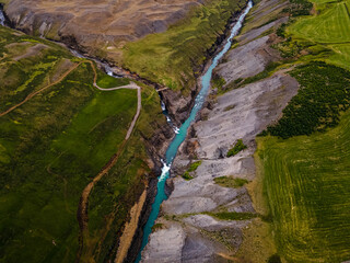Beautiful aerial view of the studlagil canyon, and the largest number of basalt rock columns in...
