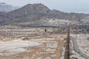 Snowy landscape of the wall that divides Mexico from the United States in Ciudad Juárez, border with El Paso, Texas.
