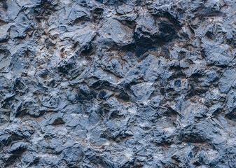 Silver Wall. Stone background. Rock background. Rock texture. Black texture. Dark marble. Rock pile. Paint spots. Rock surface with cracks. Grunge Rough structure. Abstract texture.