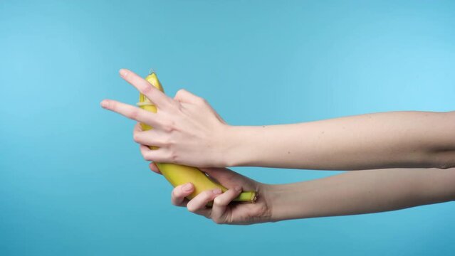 Girl putting on a transparent condom