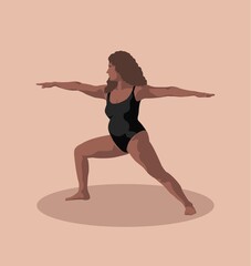 Fototapeta na wymiar yogi woman in black swimsuit in warrior pose