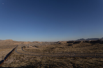 Sunset on the wall that divides the border between Mexico and the United States in Ciudad Juárez Chihuahua and El Paso Texas,