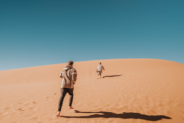 Fototapeta na wymiar Running up the Sahara. 