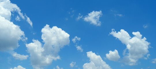 Clouds in the blue sky. clear sky...White clouds in the beautiful blue sky...Blue sky with white clouds in the background...White fluffy clouds in the blue sky.