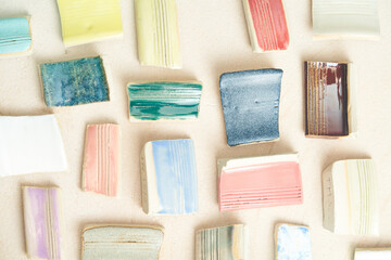 Pottery, master classes, hobbies, hand made texture background. ceramic pieces painted with glaze