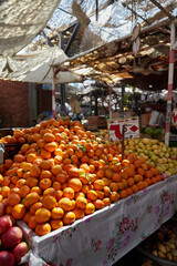 Oranges on the counter of the authentic Egyptian market. Fresh fruits in the street bazaar