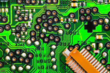 Close up of components and microchips on PC circuit board.