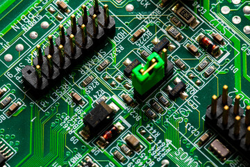 Close up of components and microchips on PC circuit board.