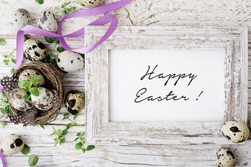 easter greeting card with quail eggs and spring flowers. mock up frame with copy space - 491525844