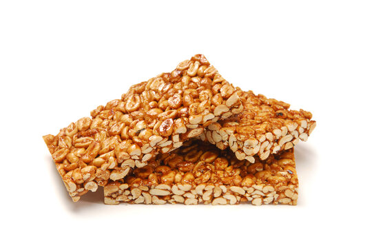 Palanqueta de man&iacute;, typical Mexican sweet peanut crunchy palanqueta, on white background with space for text