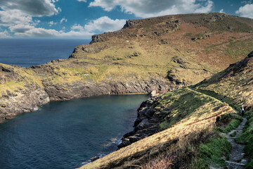 Boscastle with the South West Coast Path walk on the right, Cornwall, UK.