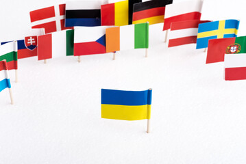 flag of Ukraine against the background of the flags of European countries. European countries do not accept Ukraine into the European Union.